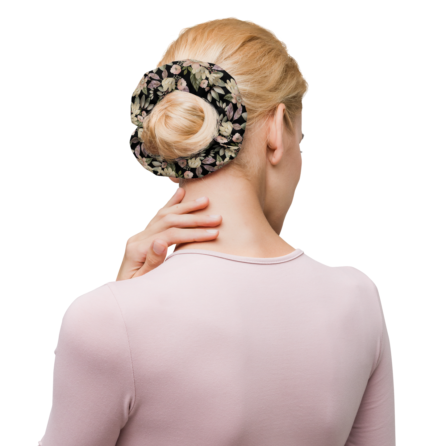 Woman with floral scrunchie in her hair bun