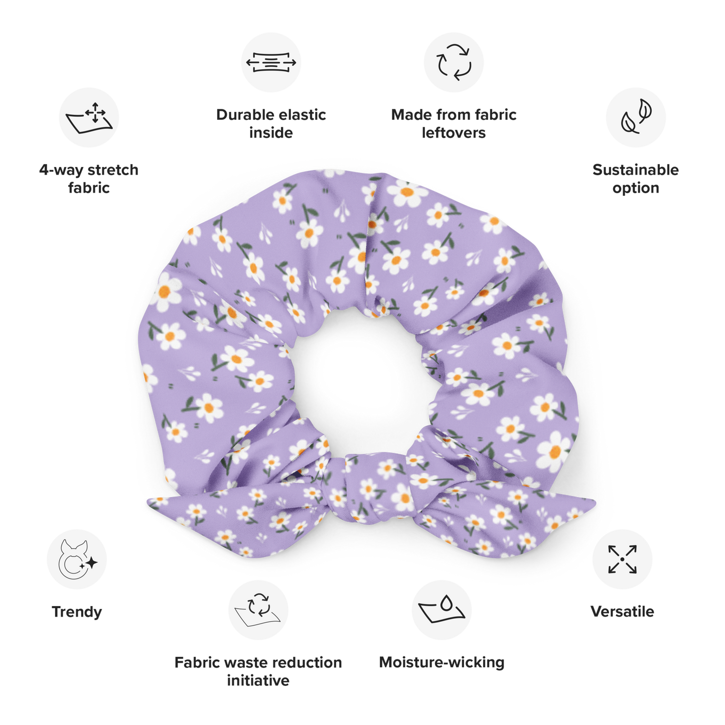 Purple floral scrunchie with sustainability features listed on a white background