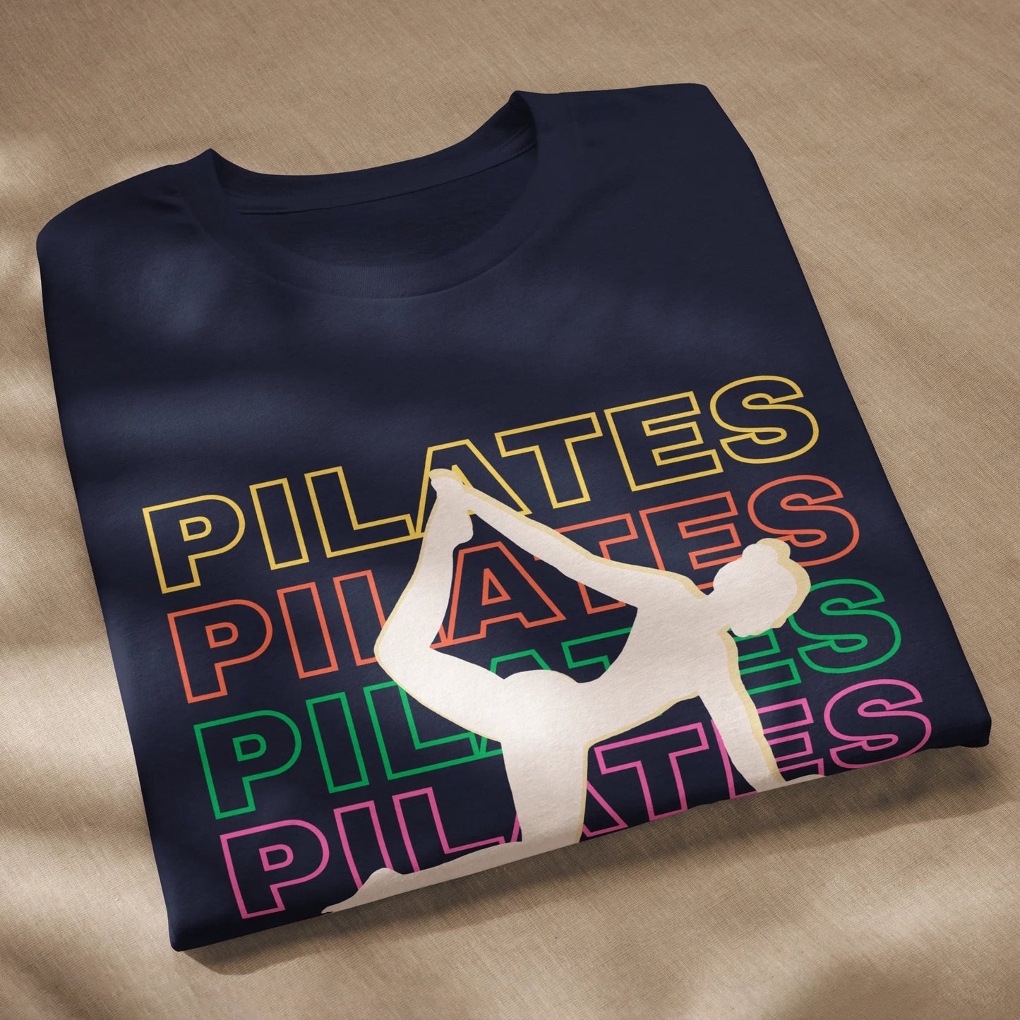 Woman wearing colorful Pilates t-shirt with bold fitness design – perfect for active lifestyle, gym, and wellness lovers
