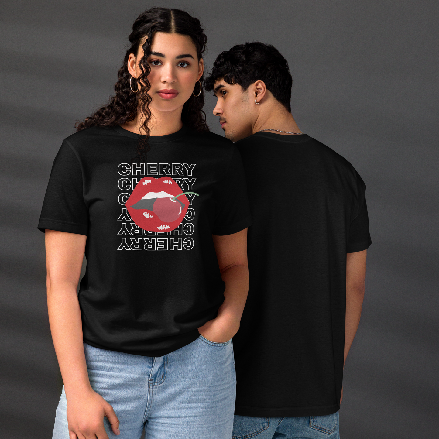 Model wearing lip-biting cherry tee, perfect for flirty casual looks and trendy streetwear.