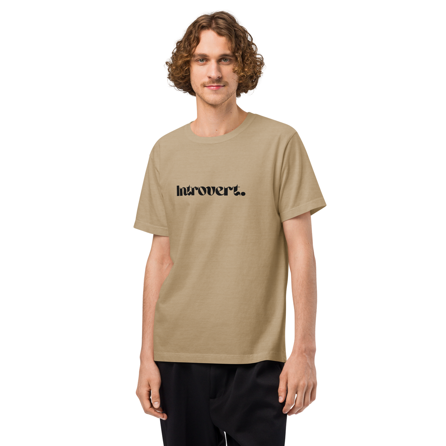 Man wearing a beige t-shirt with 'Introvert' text on a white background