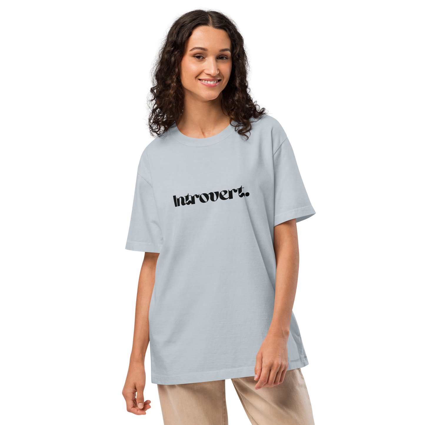 Woman wearing a light blue t-shirt with text on a white background
