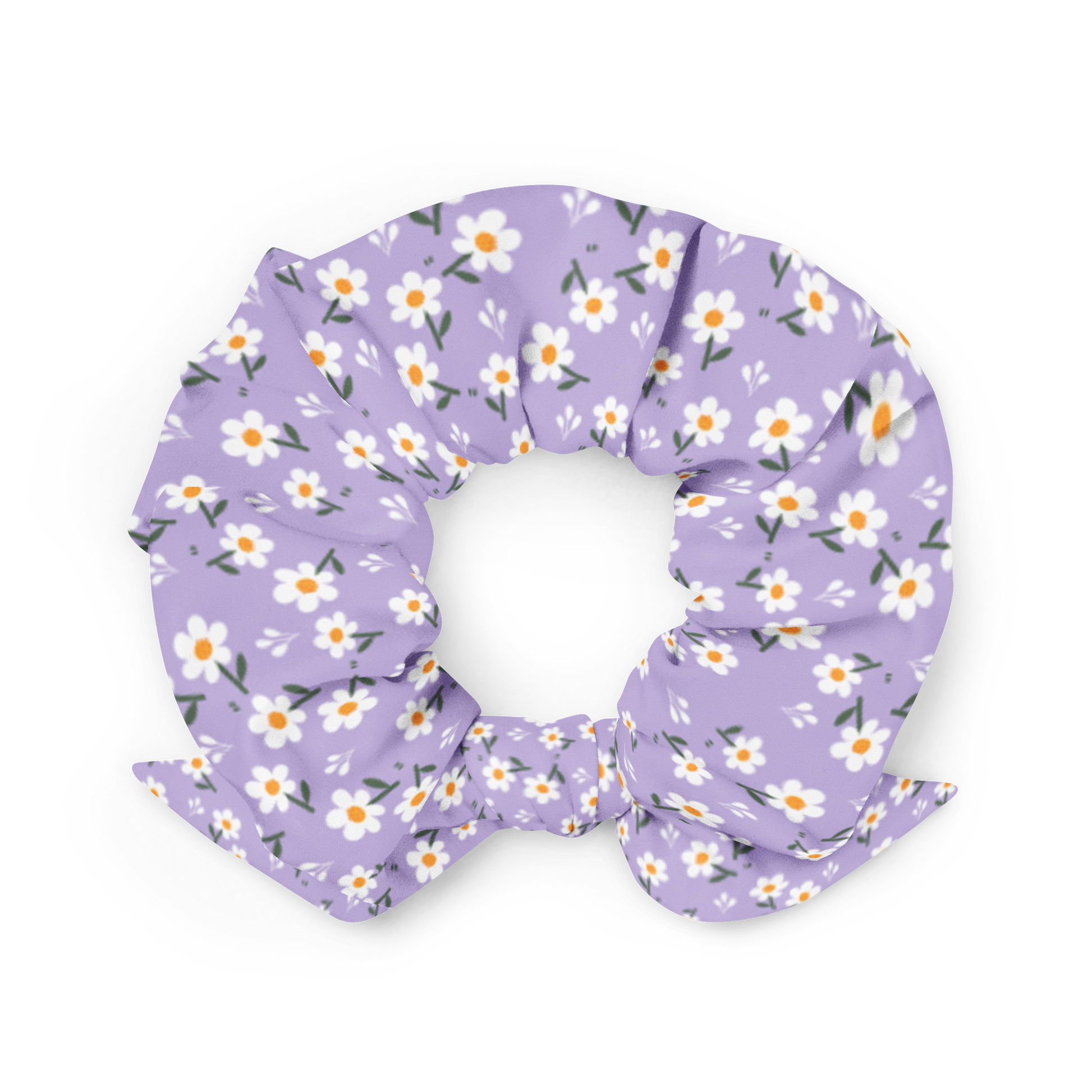 Purple scrunchie with floral pattern on a white background