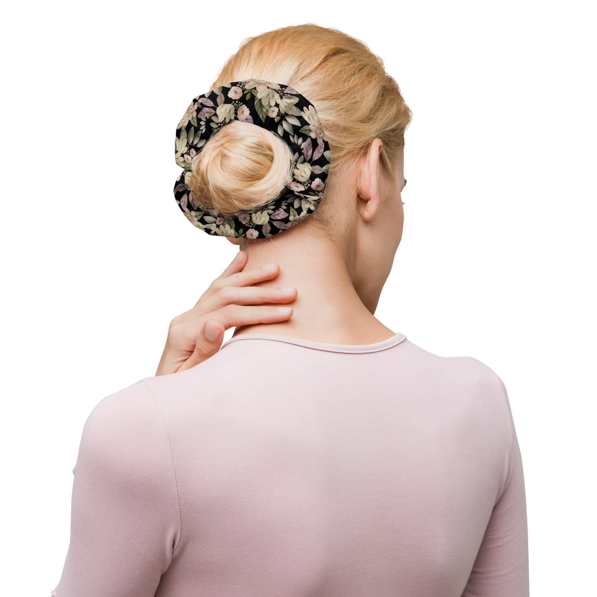 Woman with floral scrunchie in her hair bun 