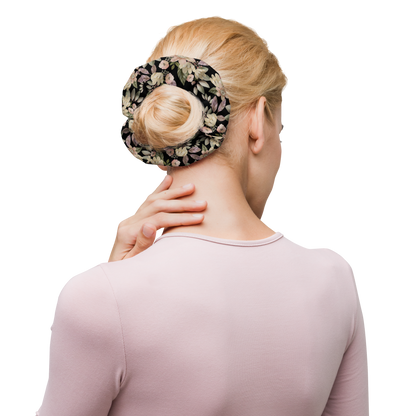 Woman with floral scrunchie in her hair bun 