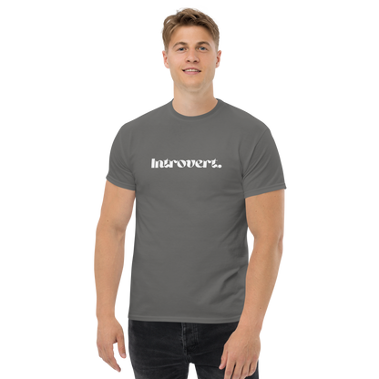 Man wearing a gray t-shirt with 'Introvert' text on a white background