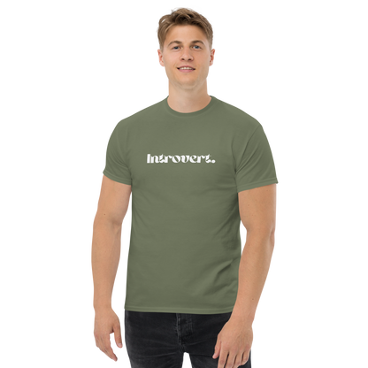 Man wearing a green t-shirt with 'Introvert' logo on a white background