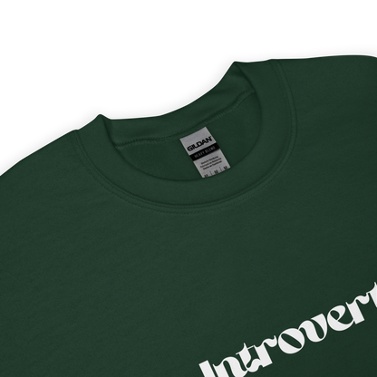 Green t-shirt with 'Introvert' text and Gildan label on a white background
