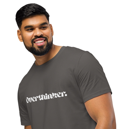 Man wearing a gray t-shirt with 'Overthinker' text on a white background