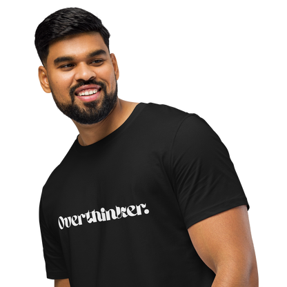 Man wearing a black t-shirt with 'overthinker' text on a white background