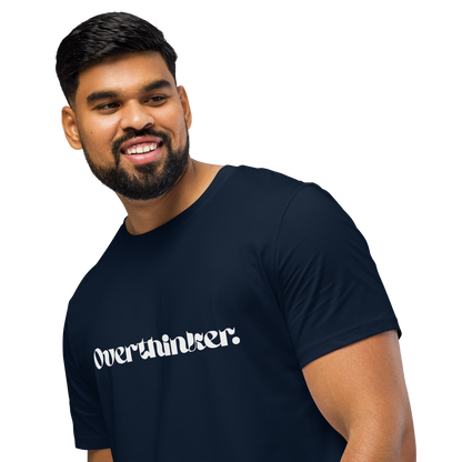 Man wearing a navy blue t-shirt with 'Overthinker' text on a white background