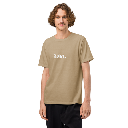 Man wearing a beige t-shirt with 'Bold' text on a white background
