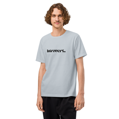 Person wearing a light blue t-shirt with 'Introvert' text on a white background